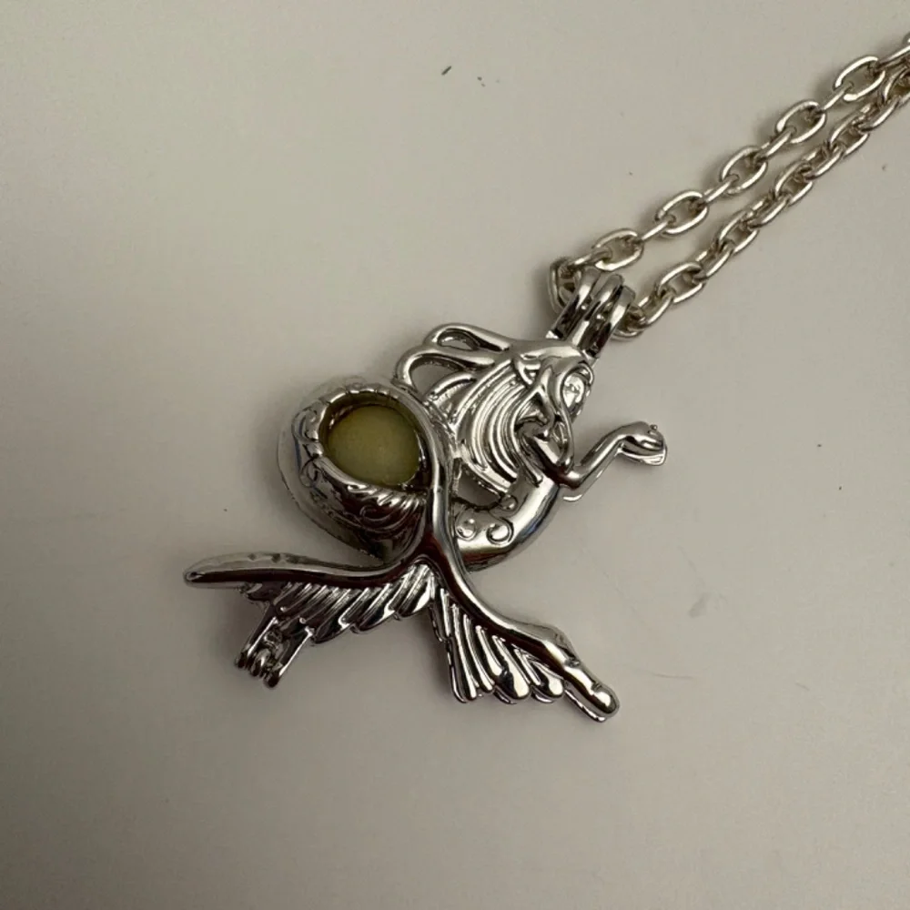 Gothic Like Mermaid Necklace features interior glow-in-the-dark orb!